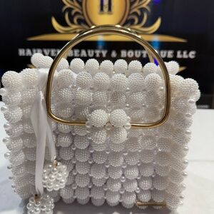Elegant White handcrafted Beaded Top-Handle Bag with Gold Accents